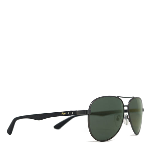 Sunglasses with black frame and green lenses on a white background