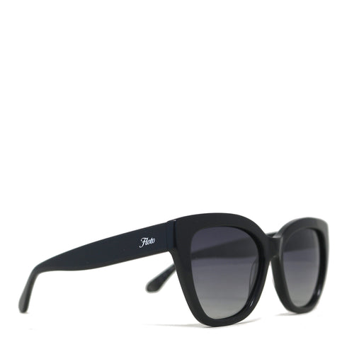 Black sunglasses with a slight tilt on a white background