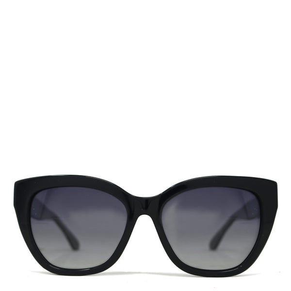 Black cat-eye sunglasses with dark lenses on a white background