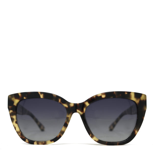 Sunglasses with tortoiseshell frame and dark lenses on a white background