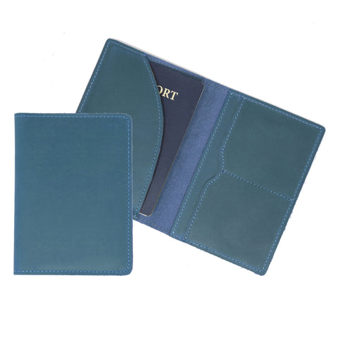 Blue leather passport holder on a white background