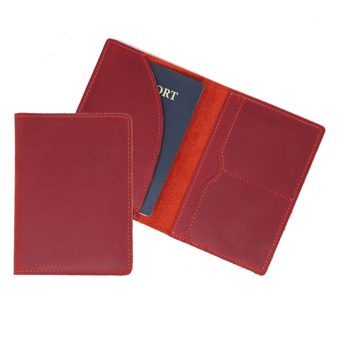 Red leather passport holder on a white background