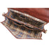 Brown leather handbag with plaid interior on a white background
