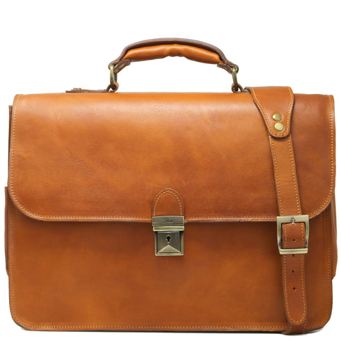 Brown leather floto duomo briefcase with gold hardware on a white background