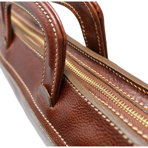 The Floto Milano Sleeve leather briefcase is a men's slime attache bag that is handcrafted in Italy. This is the Milano Sleeve in Vecchio Brown. 6