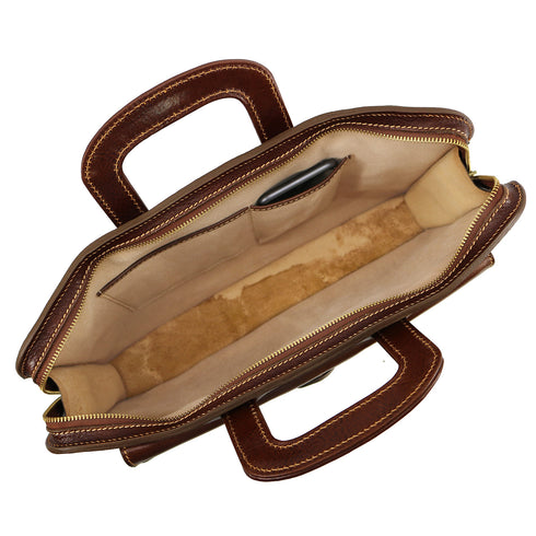 The Floto Milano Sleeve leather briefcase is a men's slime attache bag that is handcrafted in Italy. This is the Milano Sleeve in Vecchio Brown. 5