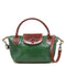 Floto Gattane Green handbag with brown handle and strap on a white background