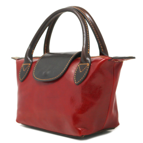 Floto Gattane Red handbag with Brown handles and trim on a white background