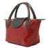 Floto Gattane Red handbag with Brown handles and trim on a white background