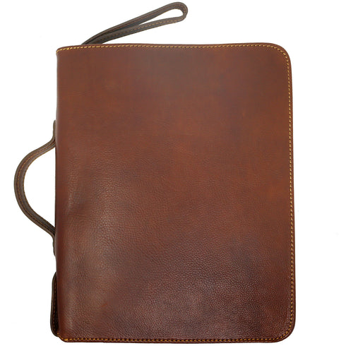 The Floto Venezia Laptop Case is a leather portfolio that is structured and has a brass zipper closure. It can hold a small size laptop and it is handcrafted in Italy with natural full grain leather. This is the Venezia Laptop Case in Vecchio Brown.