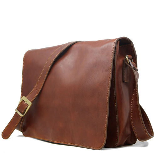 The Floto Firenze leather messenger bag is a men's casual crossbody bag that is handcrafted in Italy. This is the Firenze Messenger in Saddle Brown. 2