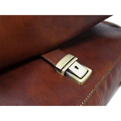 The Floto Firenze leather messenger bag is a men's casual crossbody bag that is handcrafted in Italy. This is the Firenze Messenger in Saddle Brown. 5