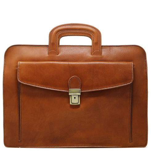 The Floto Milano Sleeve leather briefcase is a men's slime attache bag that is handcrafted in Italy. This is the Milano Sleeve in tobacco brown.