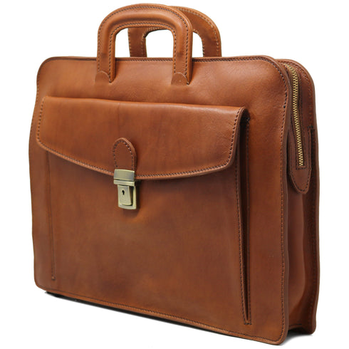 The Floto Milano Sleeve leather briefcase is a men's slime attache bag that is handcrafted in Italy. This is the Milano Sleeve in tobacco brown. 2
