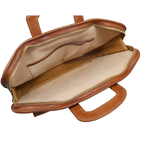 The Floto Milano Sleeve leather briefcase is a men's slime attache bag that is handcrafted in Italy. This is the Milano Sleeve in tobacco brown. 4