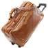 Brown leather suitcase with wheels on a white background