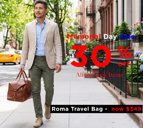 Man walking with a brown travel bag on a city street, promotional text overlay for Memorial Day Sale.