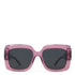 Pink sunglasses with dark lenses on a white background