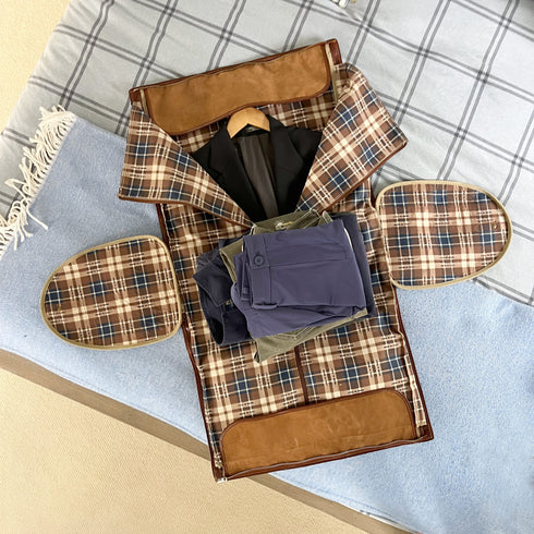 Plaid garment with folded clothes on a checkered fabric background