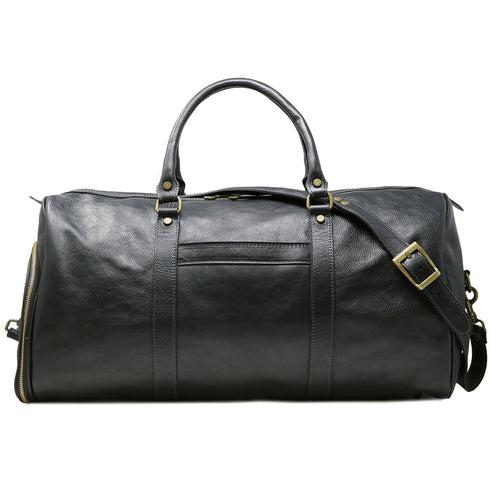 This is the Floto Lugano Weekender Duffle Bag with a built-in shoe compartment. The shoe compartment zips open on the side of the bag for easy adds. This is pictured in Black. Front View.