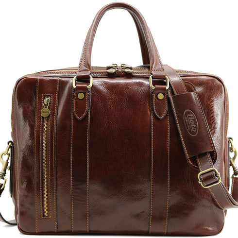 The Floto Firenze Commuter Brief is a soft sided leather messenger business bag that is made in Italy with full grain hand-stained leather. This messenger bag has 14 storage features, padded laptop pocket, and a detachable shoulder strap. This is the Firenze Commuter Brief in Vecchio Brown.