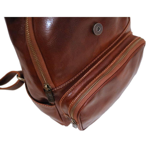 The Floto Livorno leather backpack is a wommen's fashion pack that is handcrafted in Italy. This is the Livorno Backpack in Vecchio Brown. Pocket view.