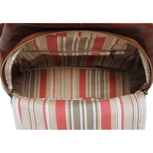 The Floto Livorno leather backpack is a wommen's fashion pack that is handcrafted in Italy. This is the Livorno Backpack in Vecchio Brown. Inside view.