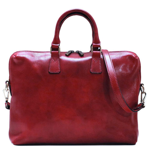 The Floto Milano Slim leather briefcase is a men's bag that is handcrafted in Italy. This is the Milano Slim in Tuscan Red.