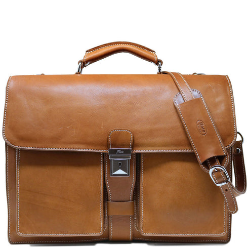 The Floto Parma leather briefcase is a men's attache business bag that is handcrafted in Italy with our famous Parma leather. Parma leather is tanned in a special way with no chemicals so the bag will get better as it ages - each briefcase takes on a unique look and darkens like a saddle over time. Parma is leather tanning the natural way.