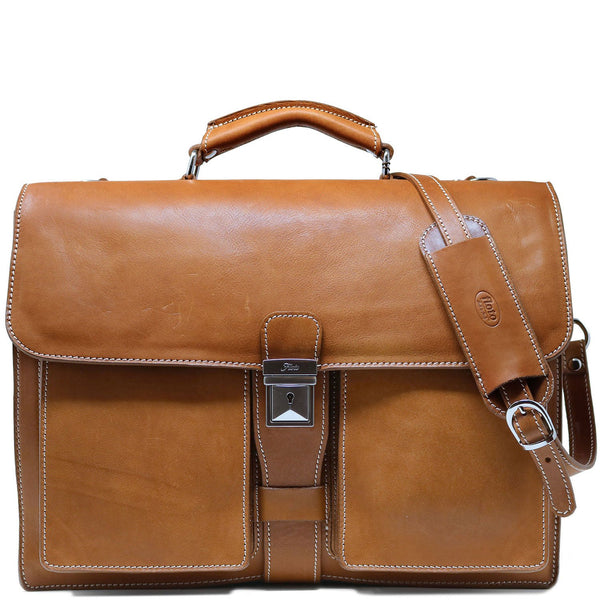 The Floto Parma leather briefcase is a men's attache business bag that is handcrafted in Italy with our famous Parma leather. Parma leather is tanned in a special way with no chemicals so the bag will get better as it ages - each briefcase takes on a unique look and darkens like a saddle over time. Parma is leather tanning the natural way.