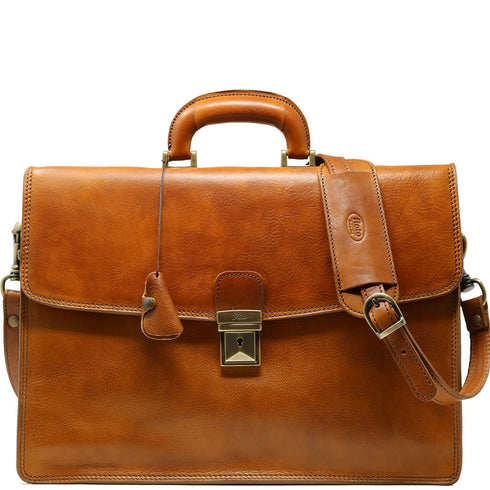 The Floto Milano leather briefcase is a men's single gusset attache bag that is handcrafted in Italy. This is the Milano Brief in Tobacco Brown.