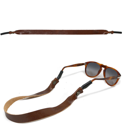 This is a Floto Sunglasses Strap eye wear retainer made from Italian full grain calfskin leather. brown