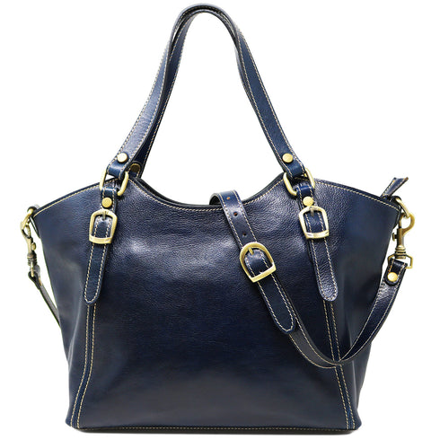 The Floto Ischia Shoulder Bag is a women's leather bag that is handcrafted in Italy. It has comfortable shoulder straps that are adjustable and includes a detachable crossbody strap. This is the Ischia Shoulder Bag in Blue.
