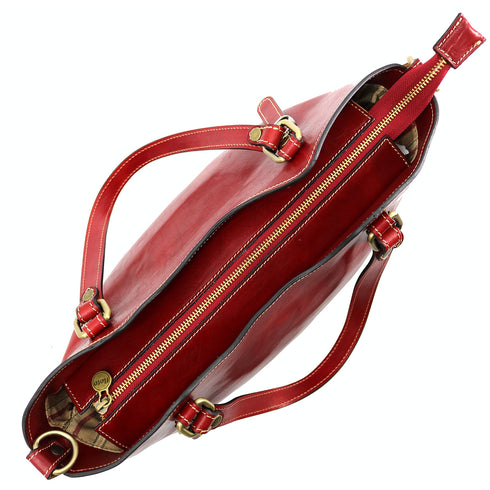 The Floto Ischia Shoulder Bag is a women's leather bag that is handcrafted in Italy. It has comfortable shoulder straps that are adjustable and includes a detachable crossbody strap. This is the Ischia Shoulder Bag in Tuscan Red - top view.
