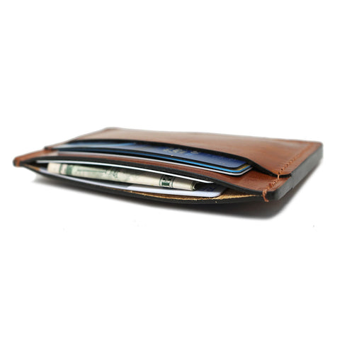 This is a Floto Wallet made from full grain calfskin leather. This model is the Sono Wide Card Wallet in Brown. 3